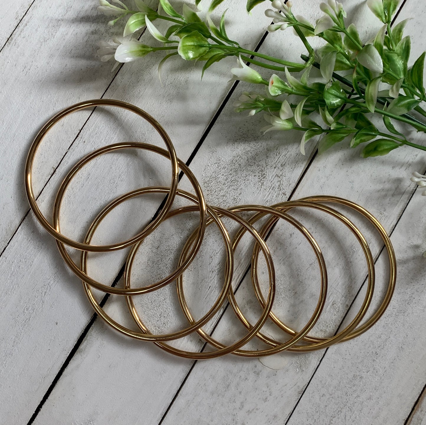 SEVEN GOLD BANGLES